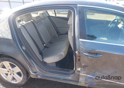 2009 Volkswagen Passat Komfort из США, поврежденный, VIN WVWJK93C09P051785